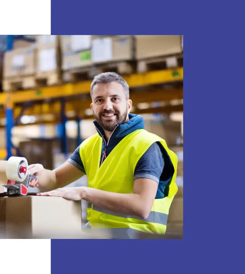Warehouse worker packaging a semi-truck part order